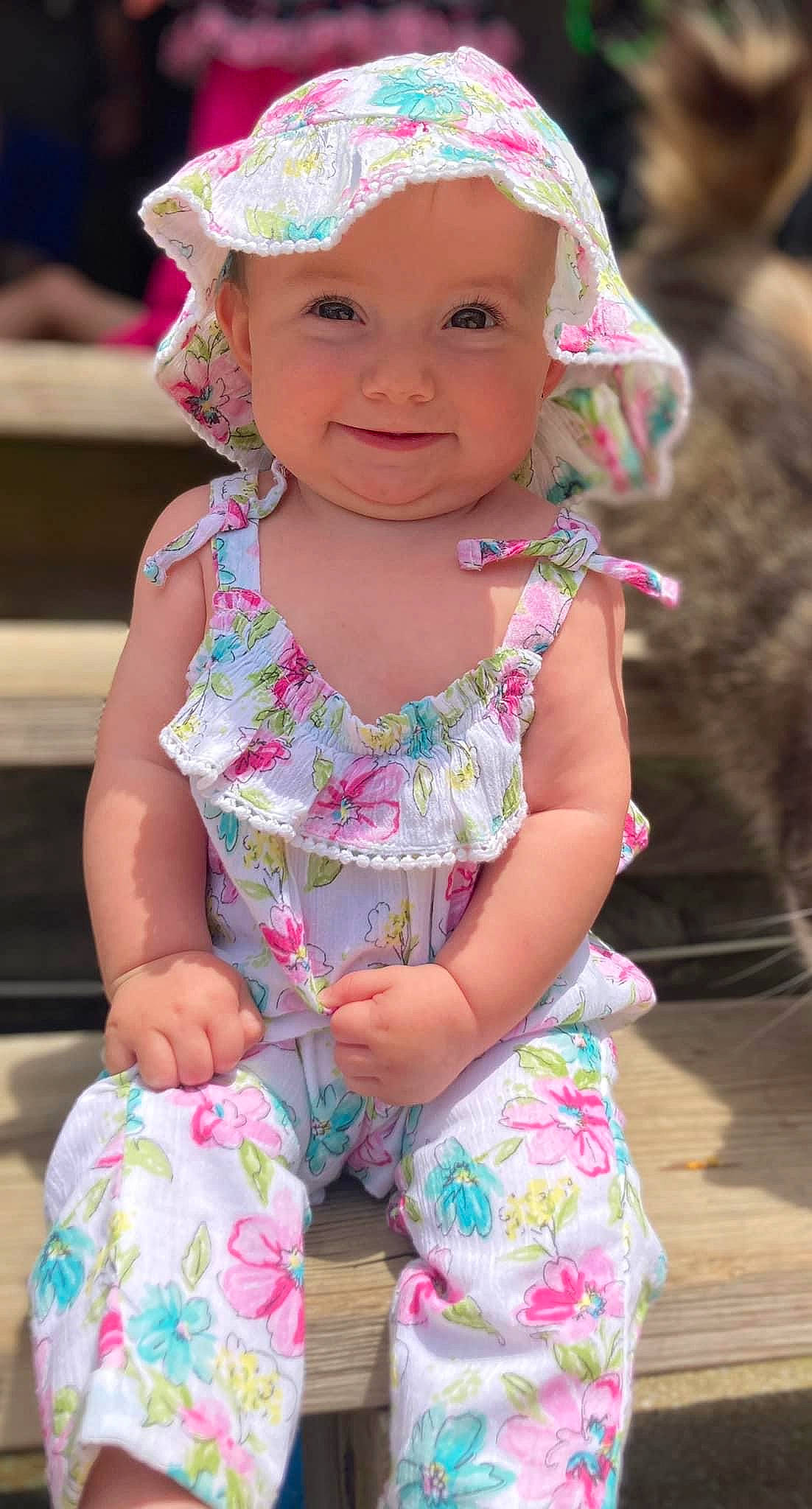 Zayley is registered to the contest to win money with this photo: baby_toddler_clothing, blue, eye, face, facial_expression, green, hairstyle, happy, head, headwear, human, iris, joy, person, photograph, pink, purple, skin, sleeve, smile