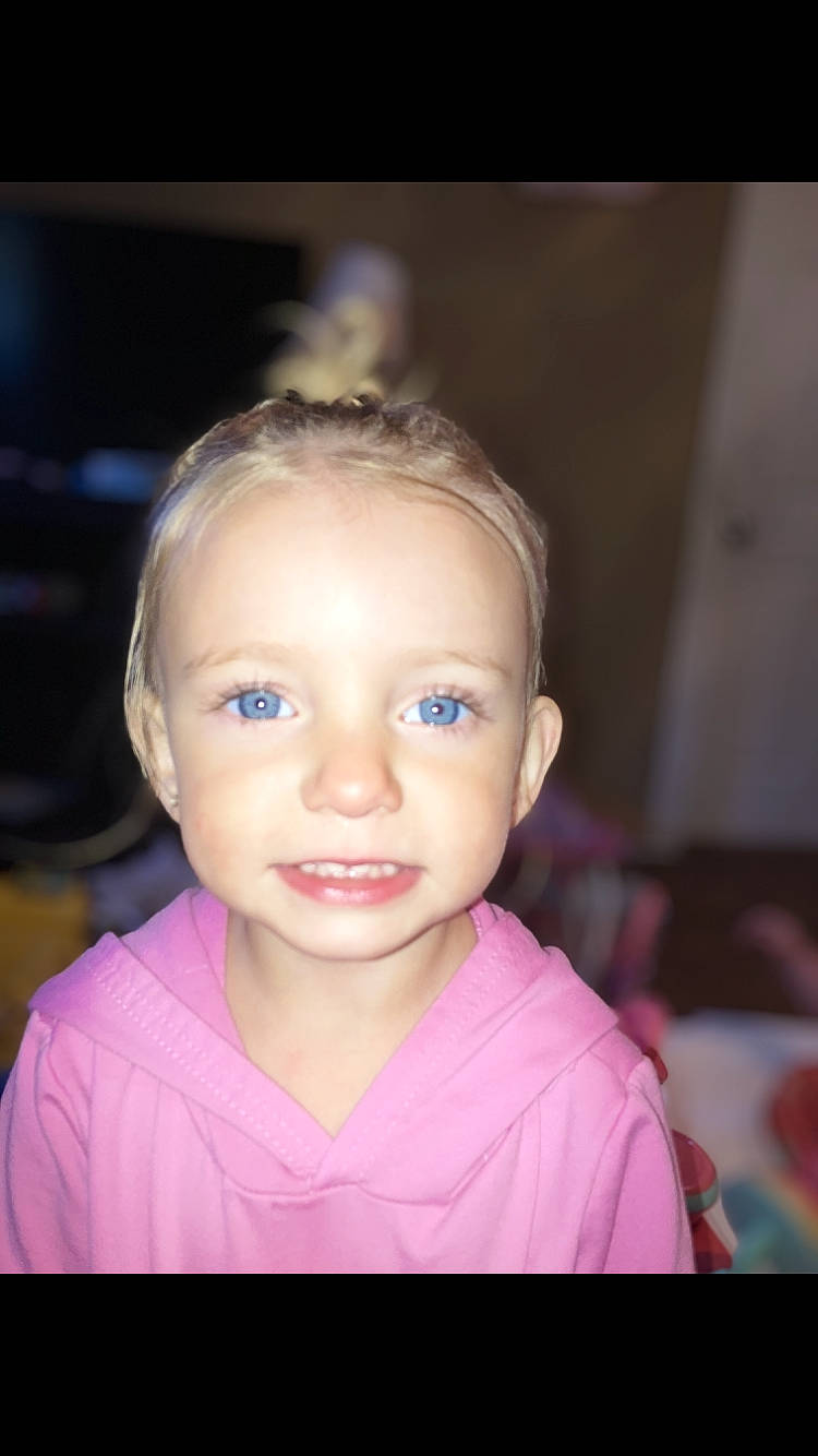 Nova is registered to the contest to win money with this photo: cheek, ear, eye, eyebrow, eyelash, face, flash_photography, forehead, hair, happy, head, jaw, lip, neck, nose, organ, person, purple, shoulder, skin