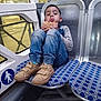 Gikka participe au concours pour gagner de l'argent avec cette photo : bodypart, boy, bread, child, clothing, face, finger, food, footwear, hand, head, jeans, male, pants, person, runningshoe, shoe, sitting, sneaker, terminal