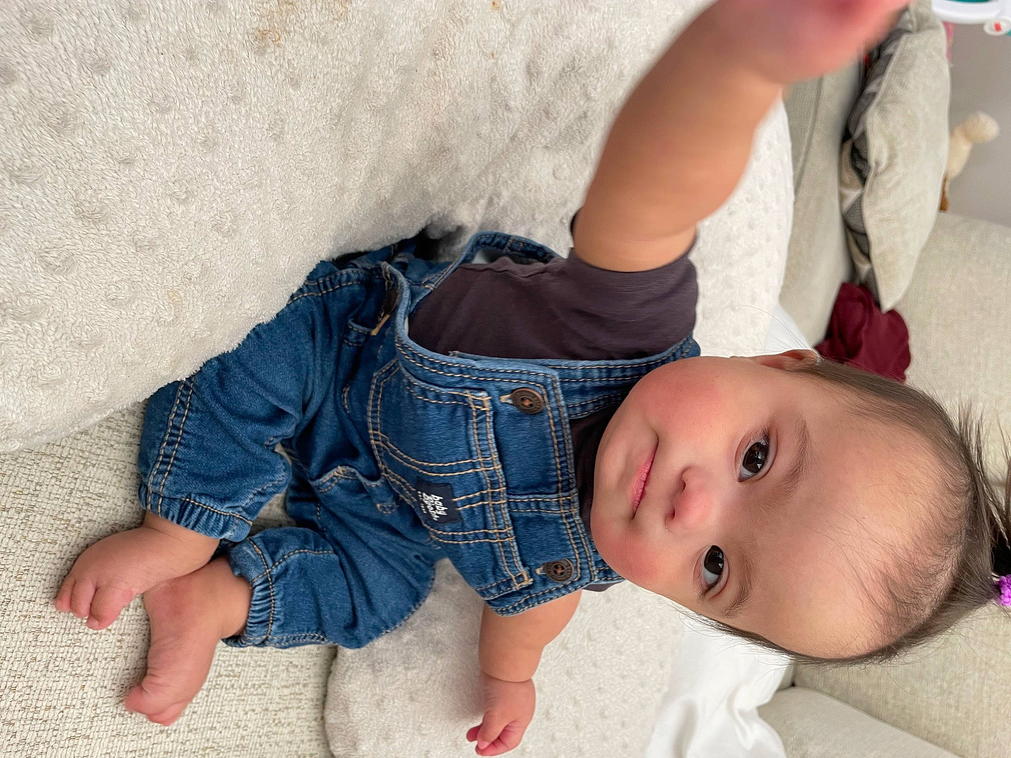 Lilianna is registered to the contest to win money with this photo: abdomen, baby, baby_toddler_clothing, barefoot, chest, comfort, denim, elbow, finger, foot, human_leg, joint, pattern, person, skin, sleeve, textile, thigh, toddler, trunk