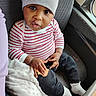 Djawël a rejoint le concours — aidez-le/la à gagner de superbes lots ! baby, beanie, blanket, candid, car_seat, child, cookie, crumbs, eating, eyes, hands, hat, infant, pants, portrait, seat, socks, striped_shirt, textured_fabric, window