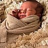 baby, blanket, child, closeup, comfort, cozy, cute, fabric, indoors, infant, newborn, peaceful, portrait, rest, sleeping, smiling, soft, texture, warm, wrapped