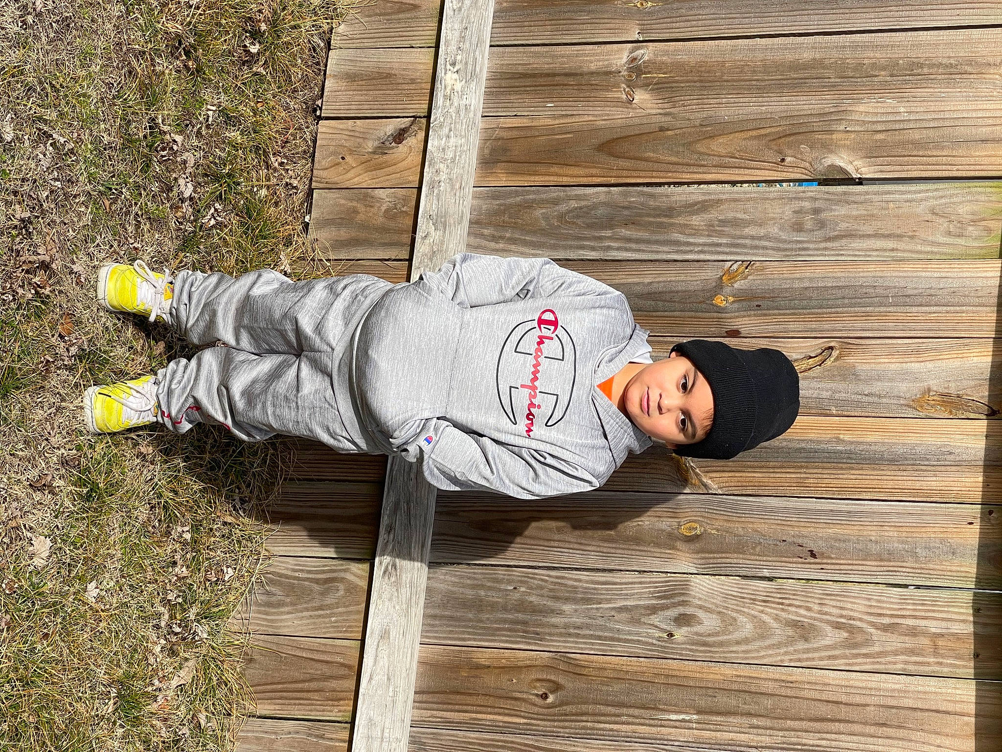 Linkin joined the competition — help win amazing prizes! child, grass, hardwood, hat, headwear, leisure, lumber, outdoor_shoe, pattern, person, plank, plant, plywood, recreation, siding, toddler, tree, walking_shoe, wood, wood_stain