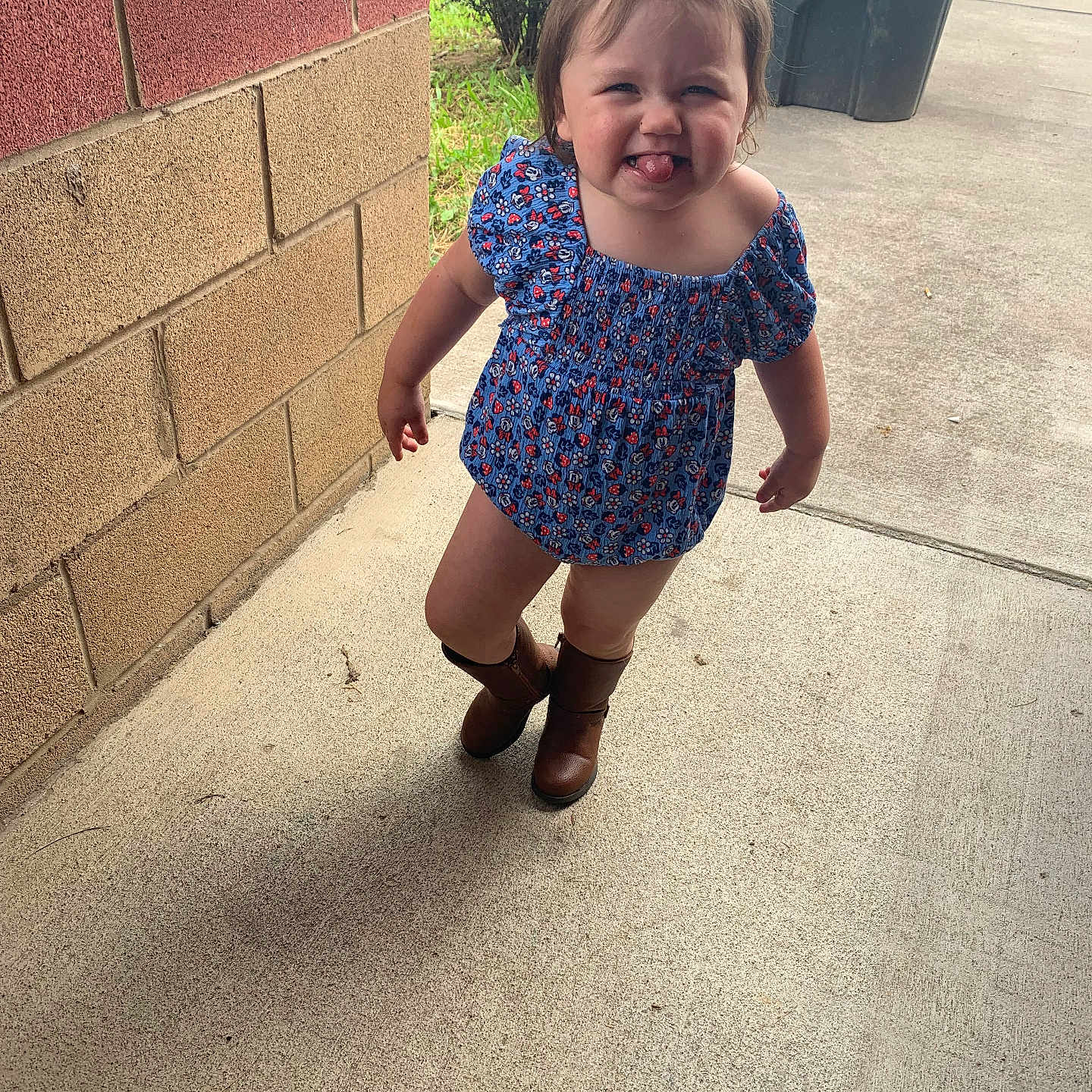 Rhylee is registered to the contest to win money with this photo: brick, child, city, clothing, dress, face, female, footwear, girl, grass, head, pants, person, photography, plant, portrait, road, shoe, street, urban
