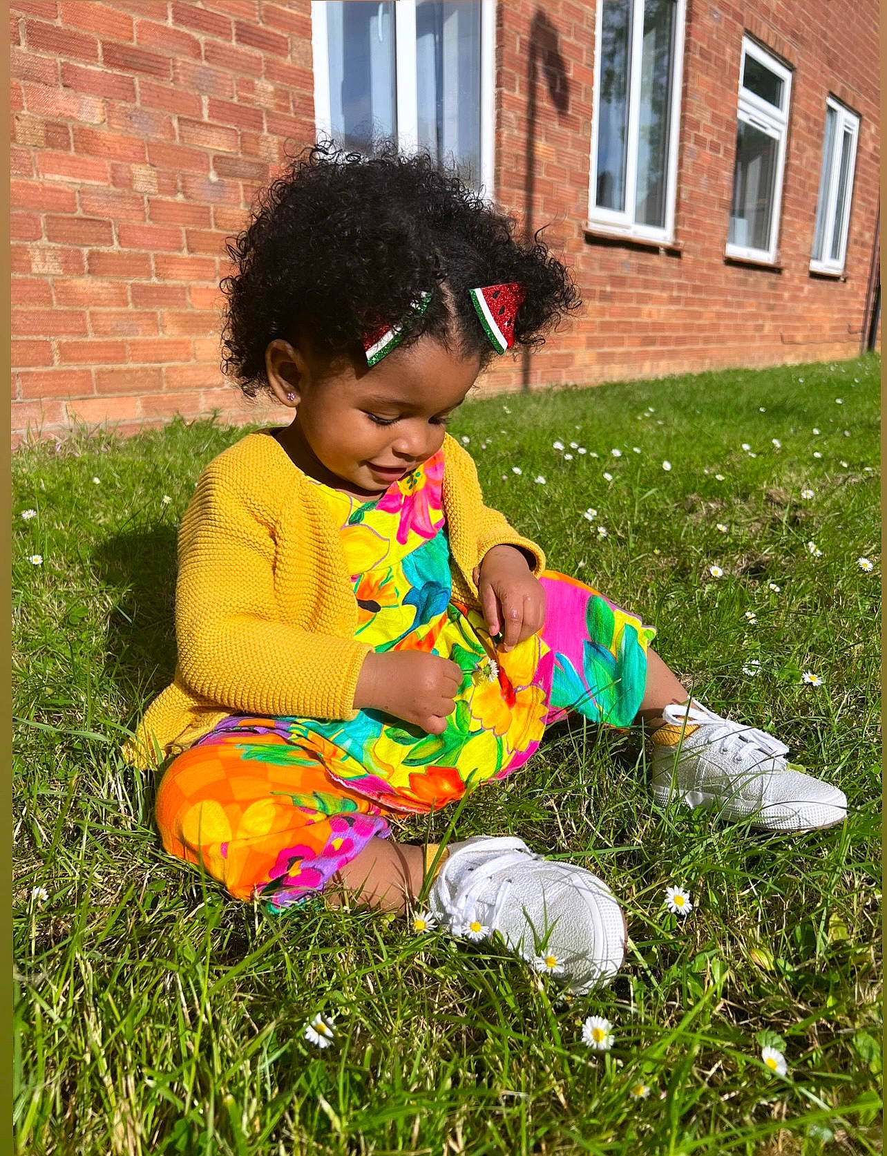 Kamila joined the competition — help win amazing prizes! baby_toddler_clothing, brick, child, fun, garden, grass, grass_family, grassland, happy, house, lawn, magenta, people_in_nature, person, personal_protective_equipment, plant, play, sitting, toddler, vertebrate