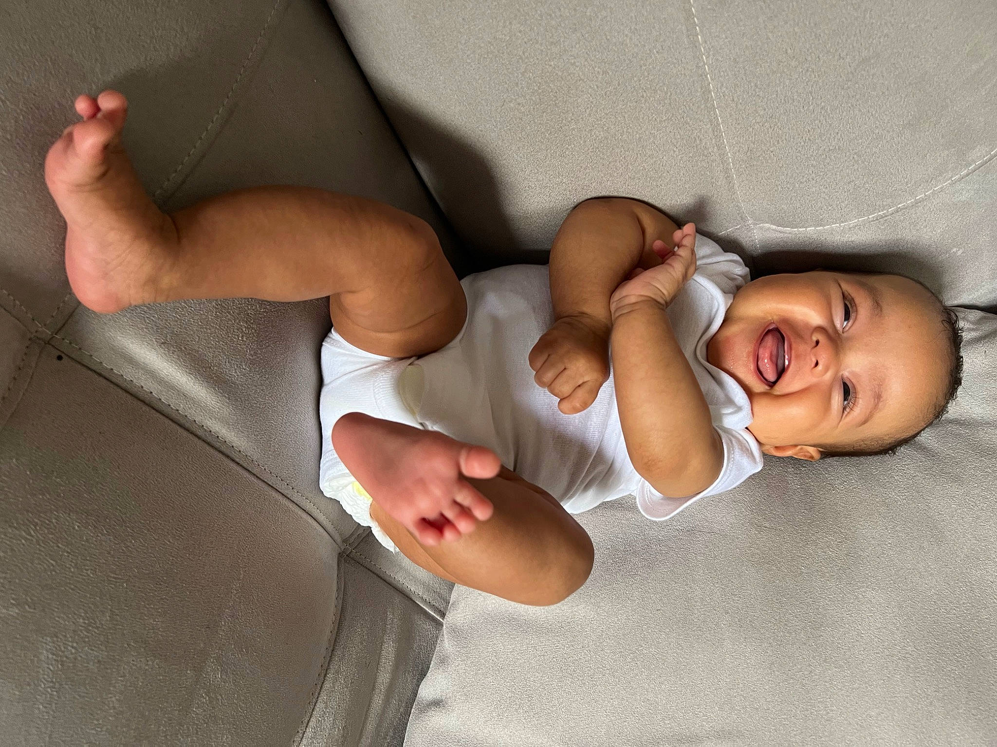 Rosalía is registered to the contest to win money with this photo: arm, chest, comfort, dress, elbow, finger, gesture, hand, happy, human_body, joint, knee, leg, muscle, neck, person, shoulder, smile, stomach, thigh