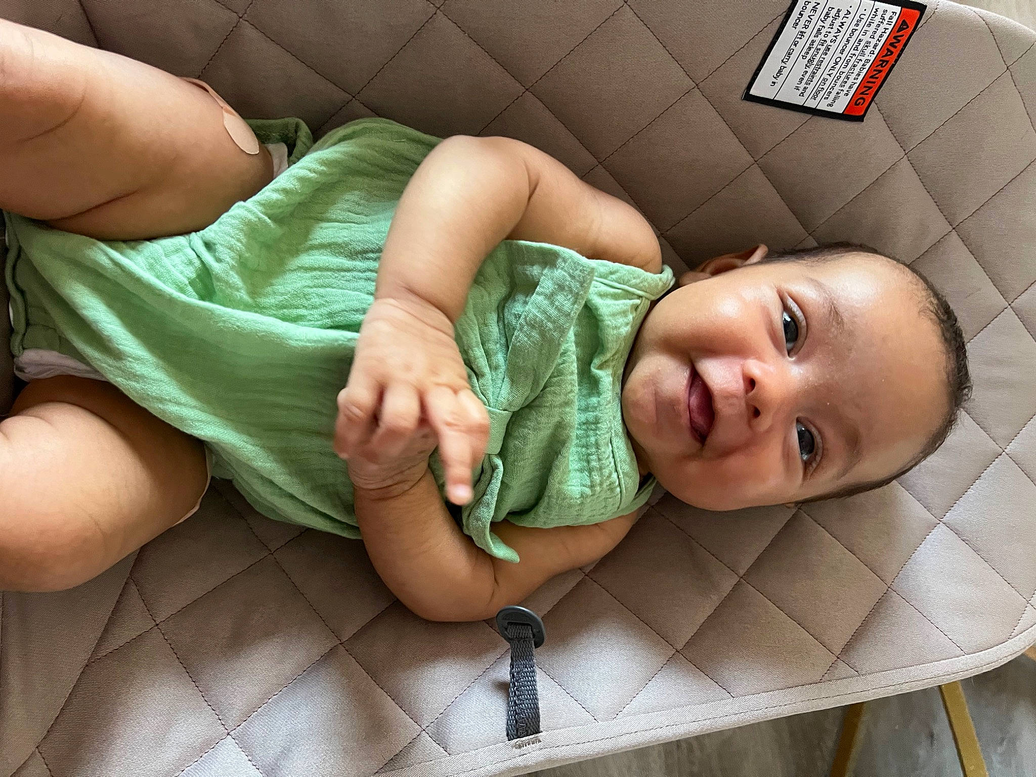 Rosalía is registered to the contest to win money with this photo: arm, baby, baby_products, baby_safety, baby_toddler_clothing, cheek, child, comfort, elbow, eye, finger, gesture, grass, hand, happy, linens, mouth, person, skin, smile