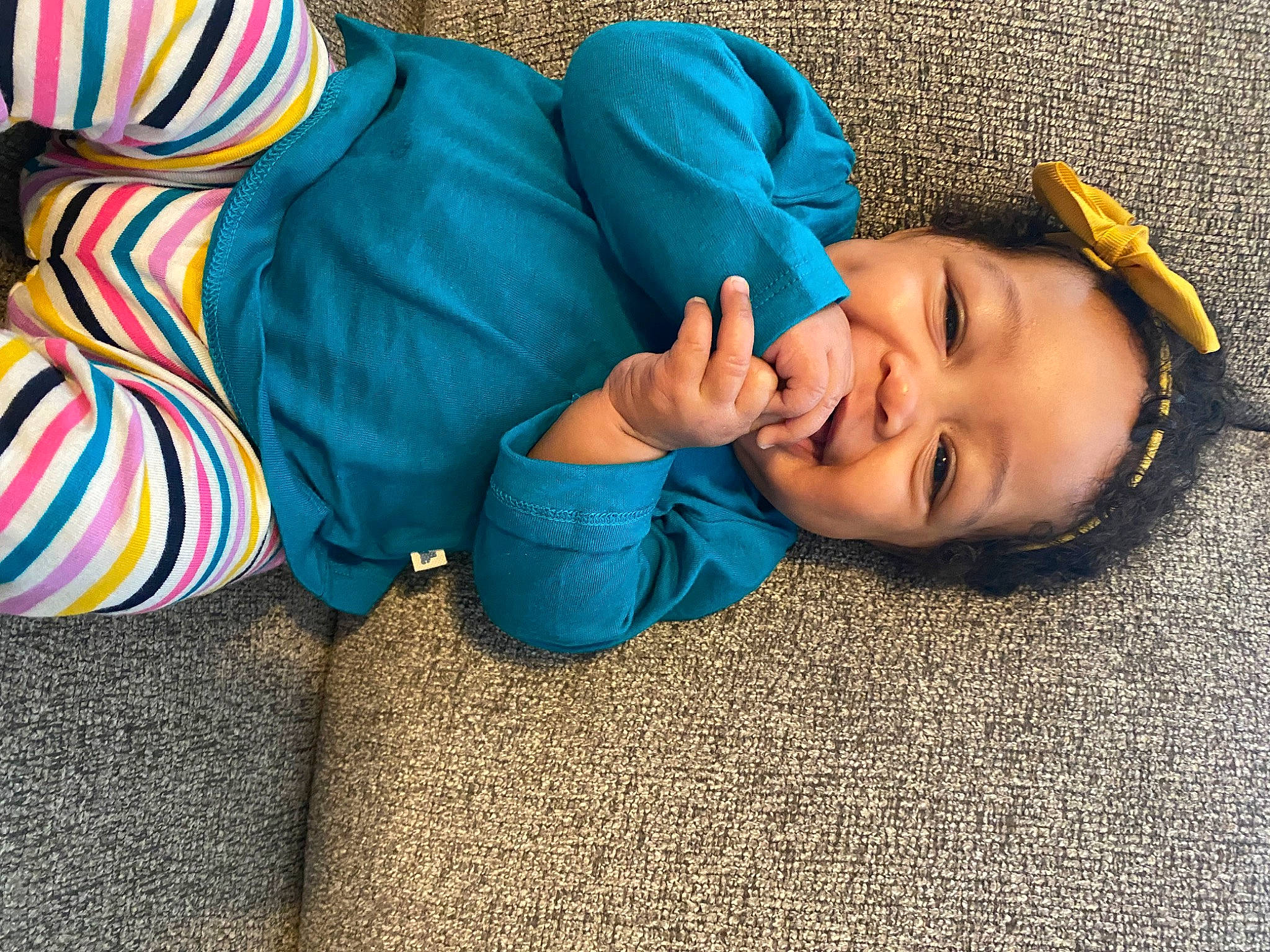 Ava joined the competition — help win amazing prizes! baby, baby_toddler_clothing, blue, child, comfort, electric_blue, fashion_accessory, flooring, fun, grass, happy, headgear, human_leg, linens, nap, person, sitting, smile, toddler, vertebrate