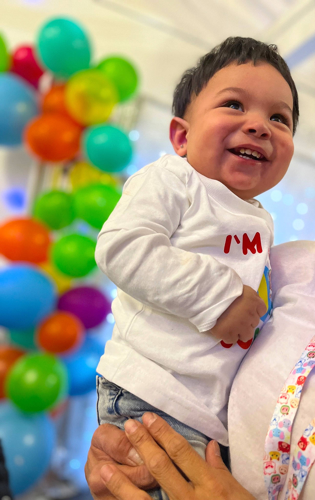 Joseph joined the competition — help win amazing prizes! baby, baby_toddler_clothing, balloon, child, event, facial_expression, fun, hand, happy, leisure, party_supply, people, person, photograph, play, product, skin, sleeve, smile, t_shirt