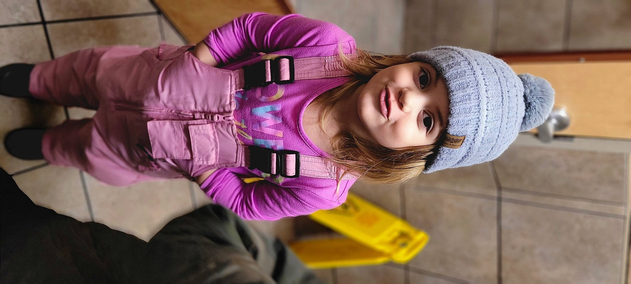 Henley is registered to the contest to win money with this photo: child, eye, eyelash, eyewear, fashion_accessory, flash_photography, fun, happy, headwear, joy, magenta, mouth, outerwear, person, pink, purple, sitting, skin, sleeve, street_fashion