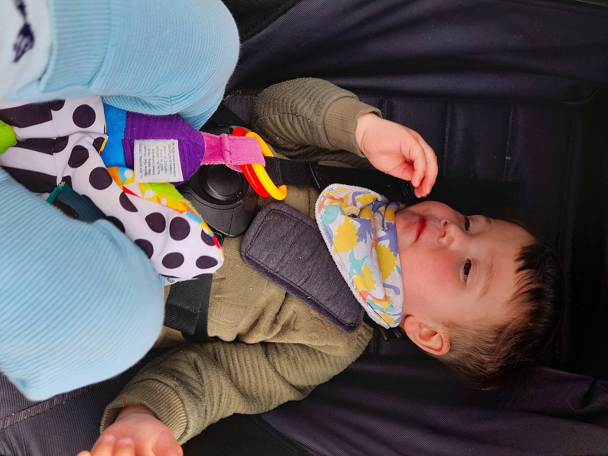 Lewis joined the competition — help win amazing prizes! baby, baby_products, baby_toddler_clothing, child, comfort, finger, fun, gesture, hand, headgear, lap, nail, pattern, person, product, sitting, sleeve, textile, thumb, toddler