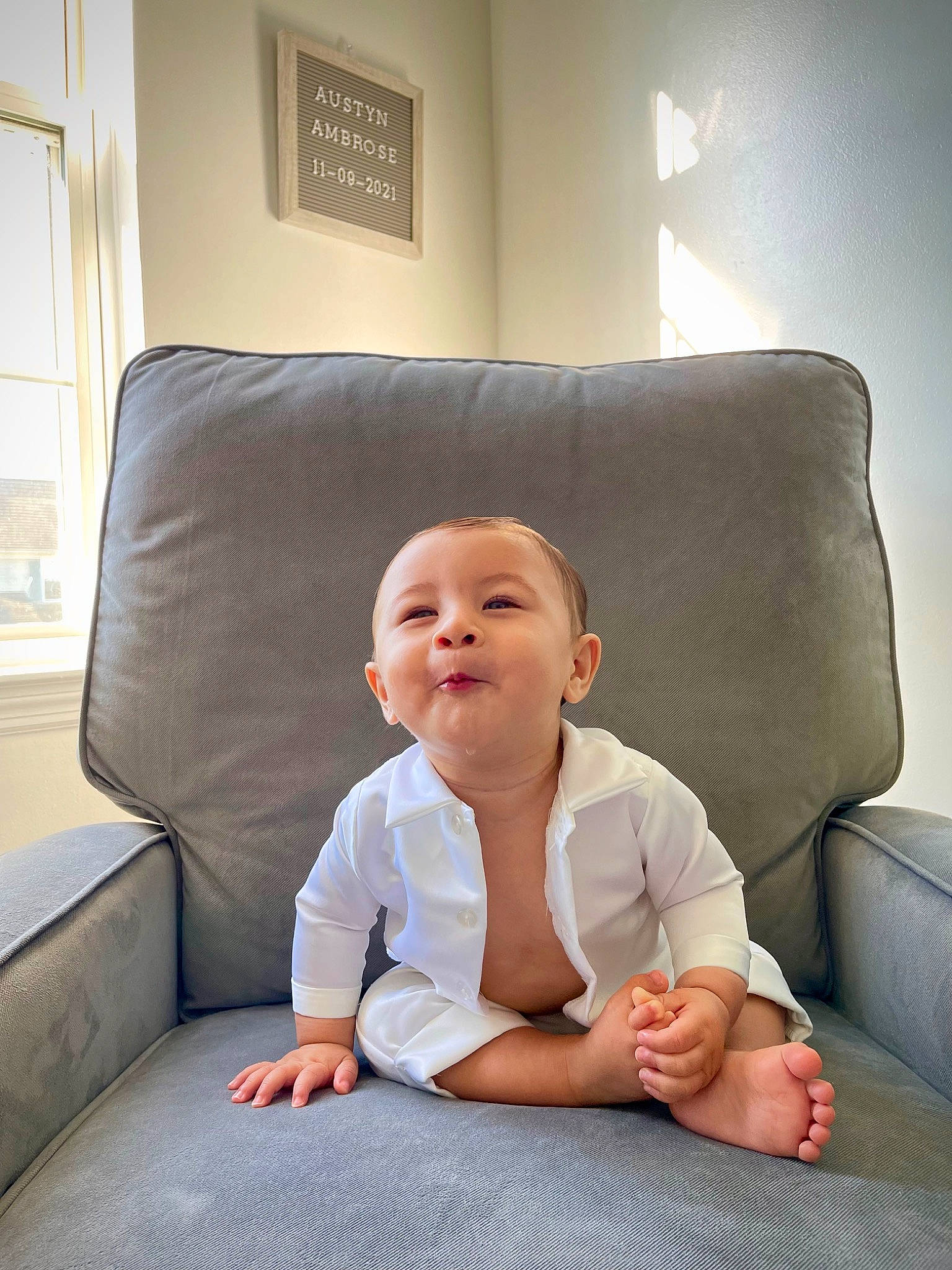 Austyn joined the competition — help win amazing prizes! baby, baby_toddler_clothing, comfort, couch, eye, flash_photography, floor, flooring, fun, furniture, human_leg, living_room, person, picture_frame, sitting, skin, sleeve, smile, studio_couch, toddler
