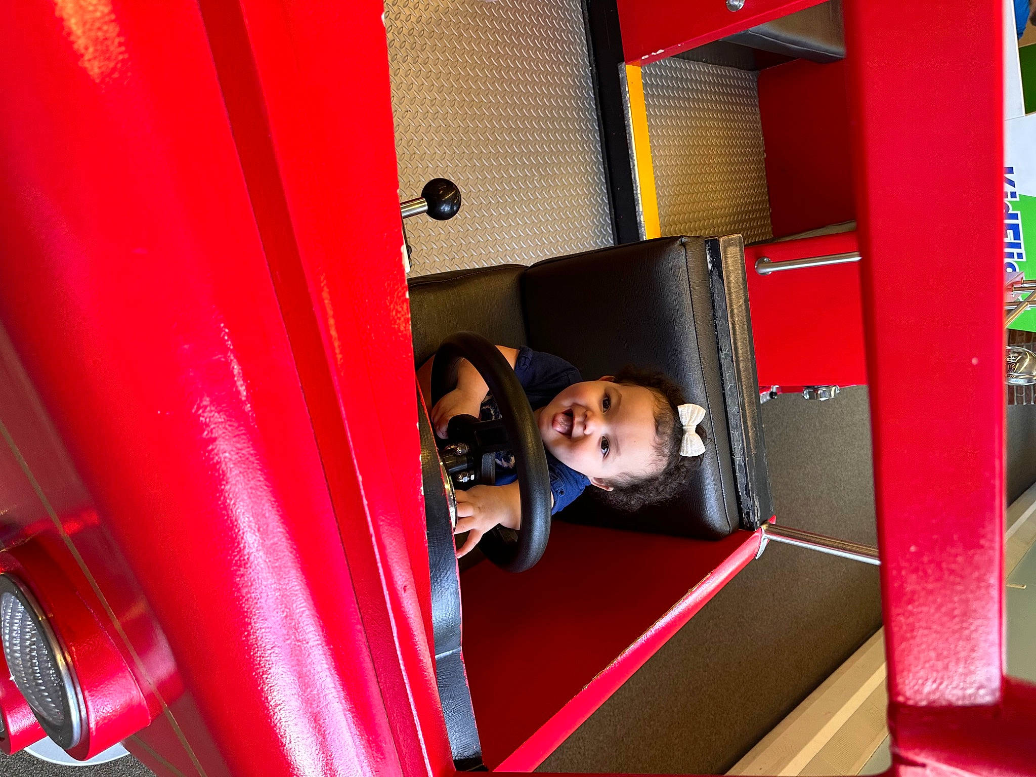 Lilly is registered to the contest to win money with this photo: carmine, child, chute, city, fun, leisure, magenta, outdoor_play_equipment, person, play, playground, playground_slide, recreation, room, toddler