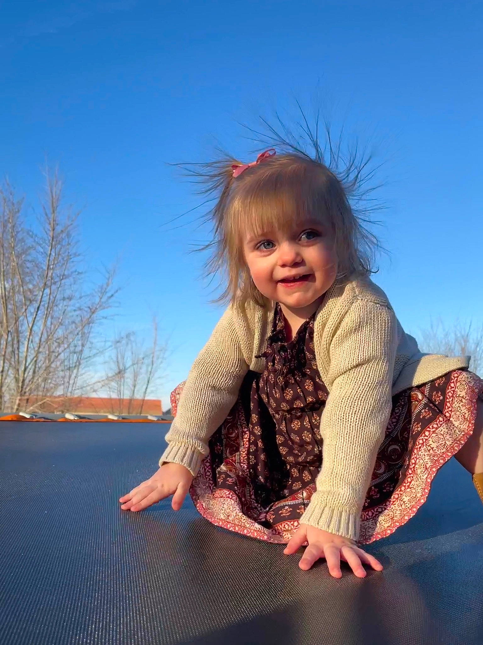 Akaileya joined the competition — help win amazing prizes! blond, dress, electric_blue, flash_photography, flooring, fun, grass, hair, happy, human_body, human_leg, joy, leisure, person, sky, sleeve, smile, toddler, trampoline, trampolining_equipment_and_supplies