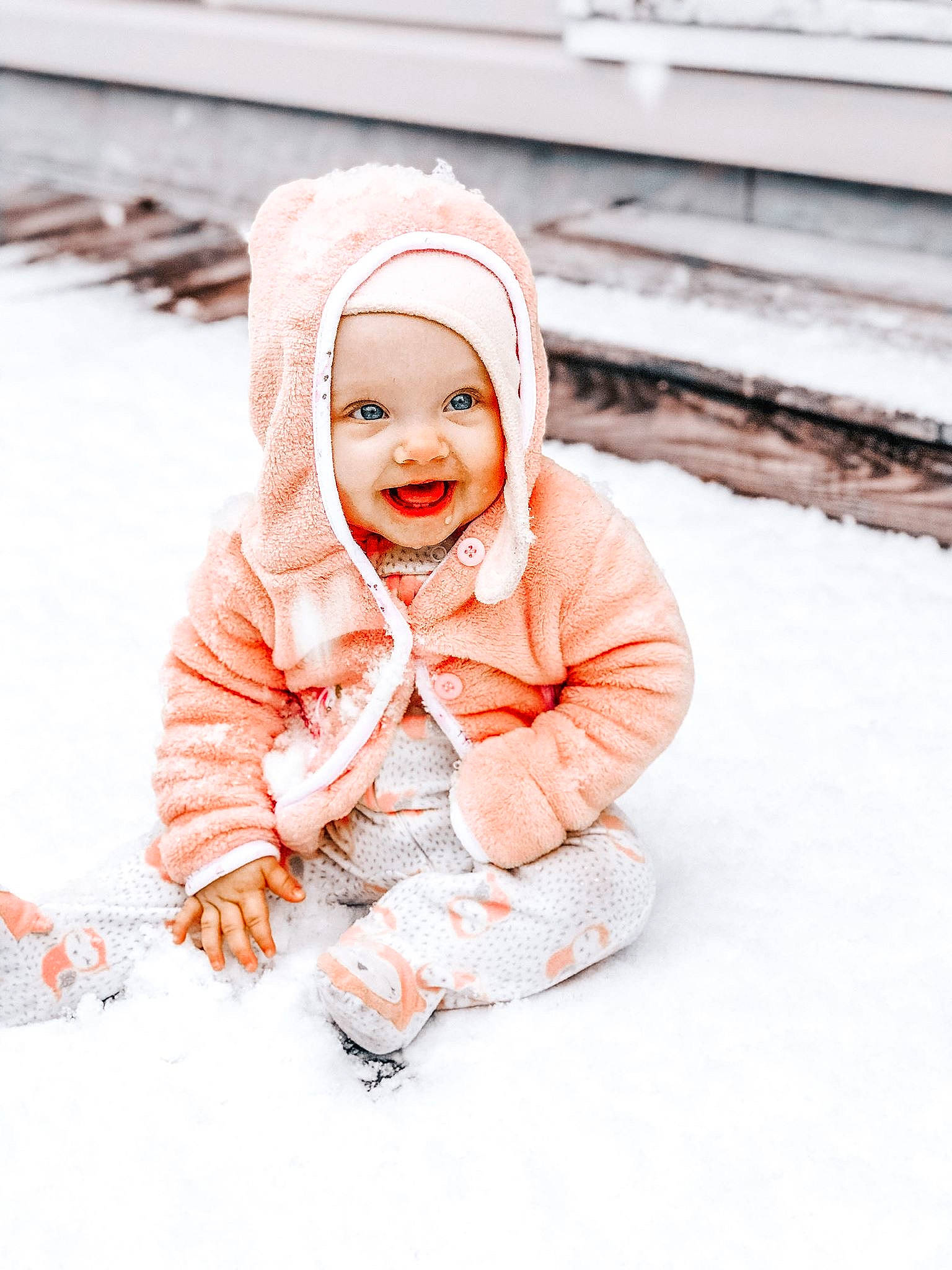 Renleigh is registered to the contest to win money with this photo: baby, child, child_model, facial_expression, happy, headgear, hood, joy, orange, outerwear, peach, person, photograph, photography, play, portrait_photography, skin, sleeve, smile, toddler
