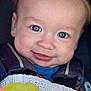 Waylon joined the competition — help win amazing prizes! baby, blue_eyes, smile, close_up, infant, knitted_blanket, cozy_clothing, face, child, cute, happy, portrait, young_child, warm, soft_texture, expression, person, adorable, seatbelt, car_seat