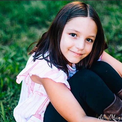 Lina is registered to the contest to win money with this photo: beauty, black_hair, brown_hair, child, child_model, eye, grass, happy, joy, lady, long_hair, model, people_in_nature, person, photo_shoot, photography, plant, portrait, portrait_photography, sitting