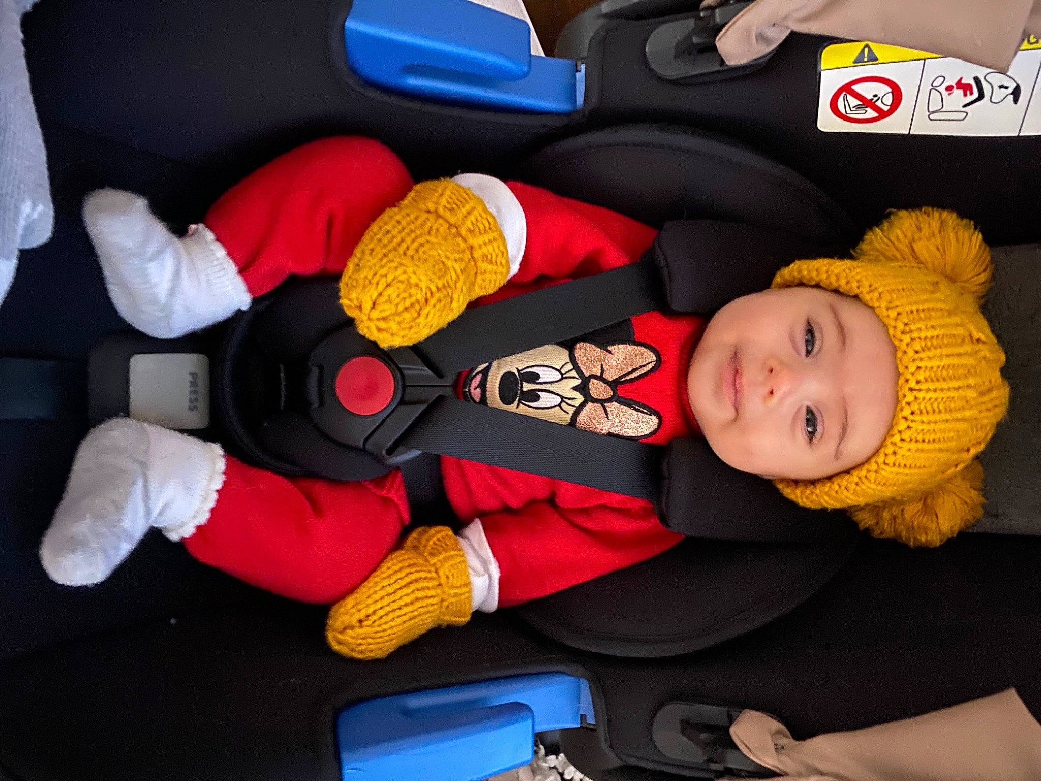 Isla Rose is registered to the contest to win money with this photo: baby, baby_products, baby_sleeping, baby_toddler_clothing, baby_toys, car_seat, child, comfort, fictional_character, fun, glove, headwear, human_body, lap, person, red, room, smile, stuffed_toy, thumb