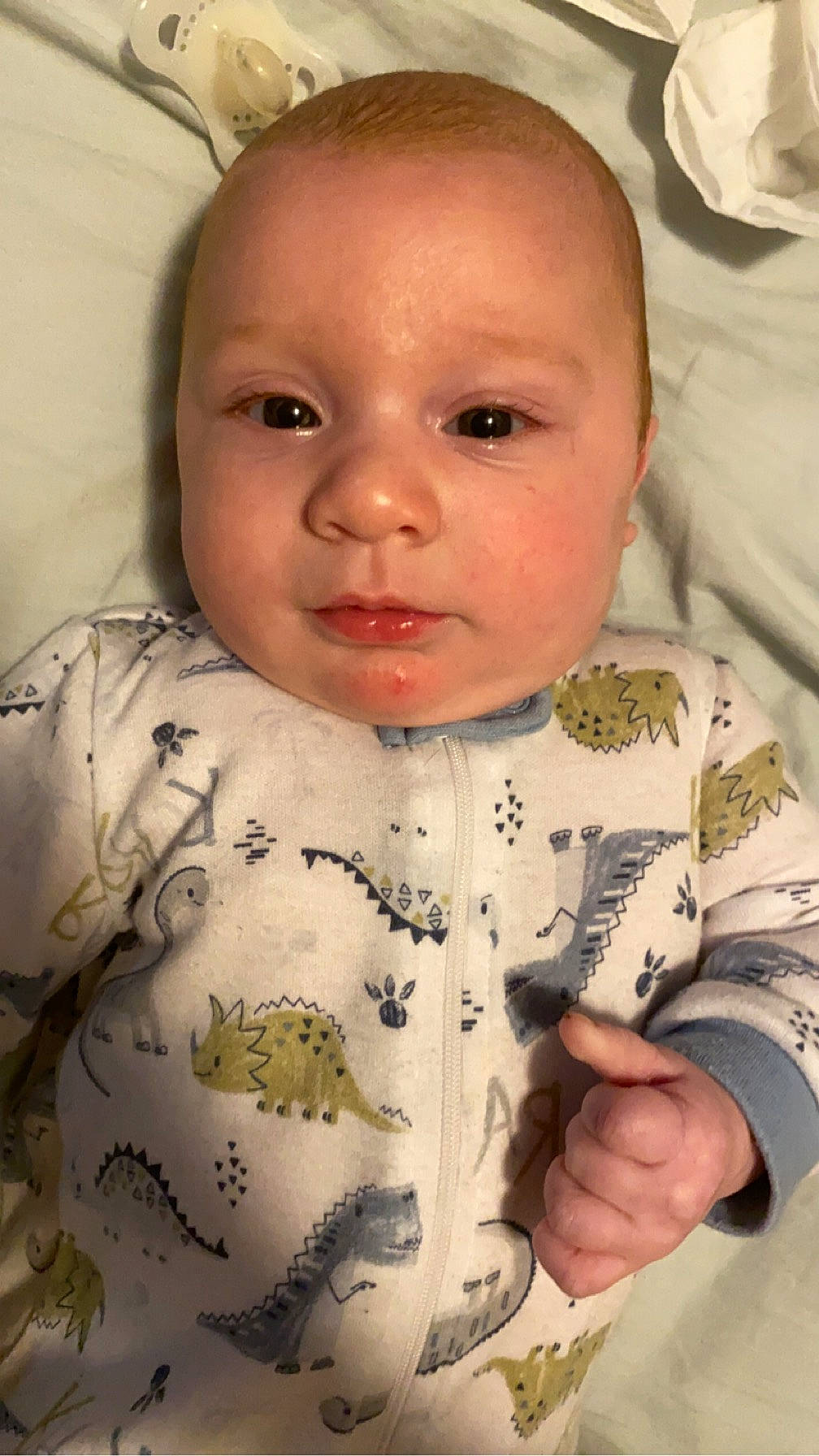 Zander is registered to the contest to win money with this photo: baby, baby_toddler_clothing, cheek, child, chin, collar, comfort, eyebrow, eyelash, finger, head, iris, linens, lip, mouth, neck, nose, person, skin, sleeve