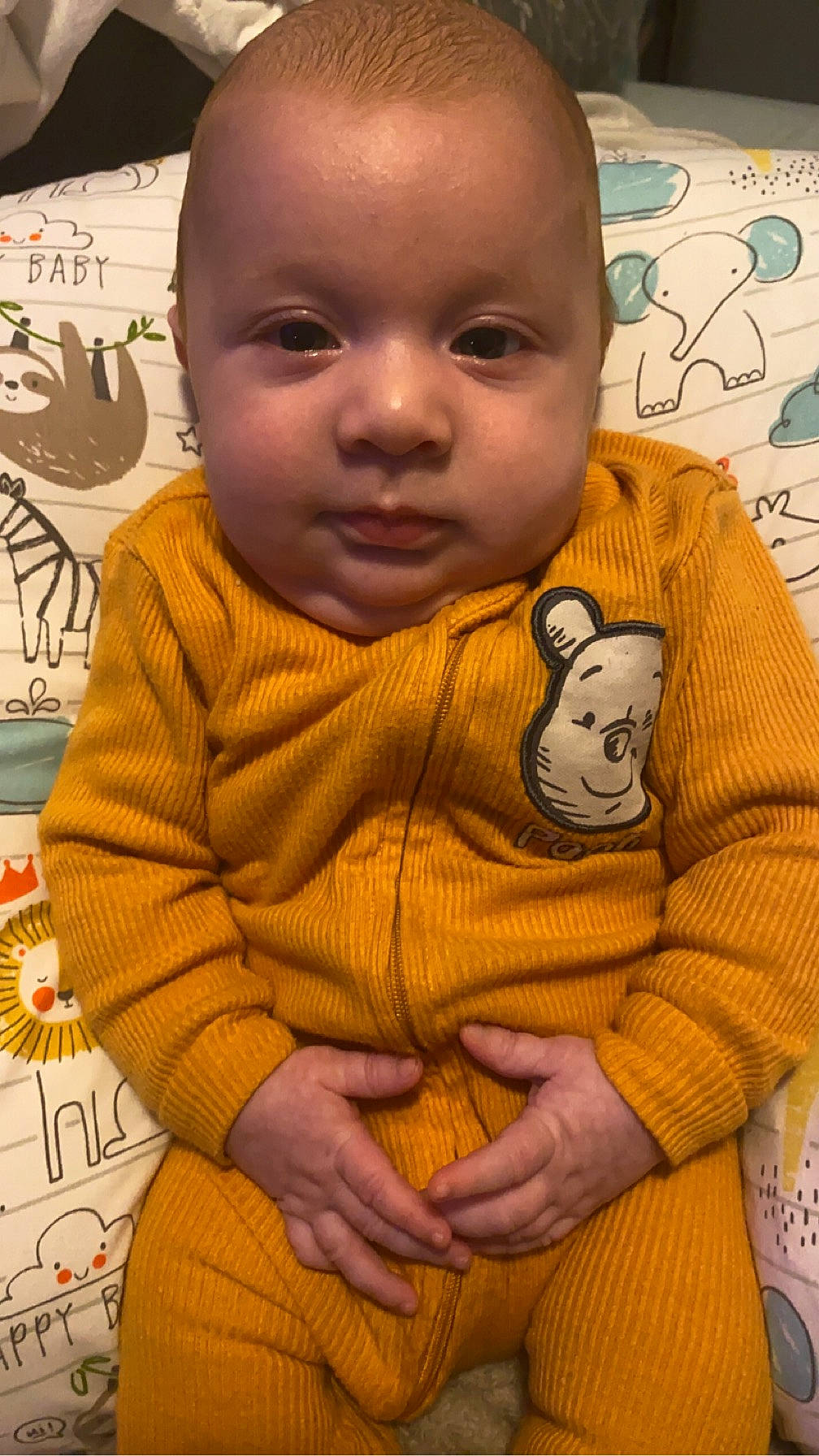 Zander is registered to the contest to win money with this photo: baby, baby_toddler_clothing, cheek, eye, face, facial_expression, finger, forehead, hairstyle, head, human, human_body, lip, mouth, nose, organ, outerwear, person, skin, sleeve