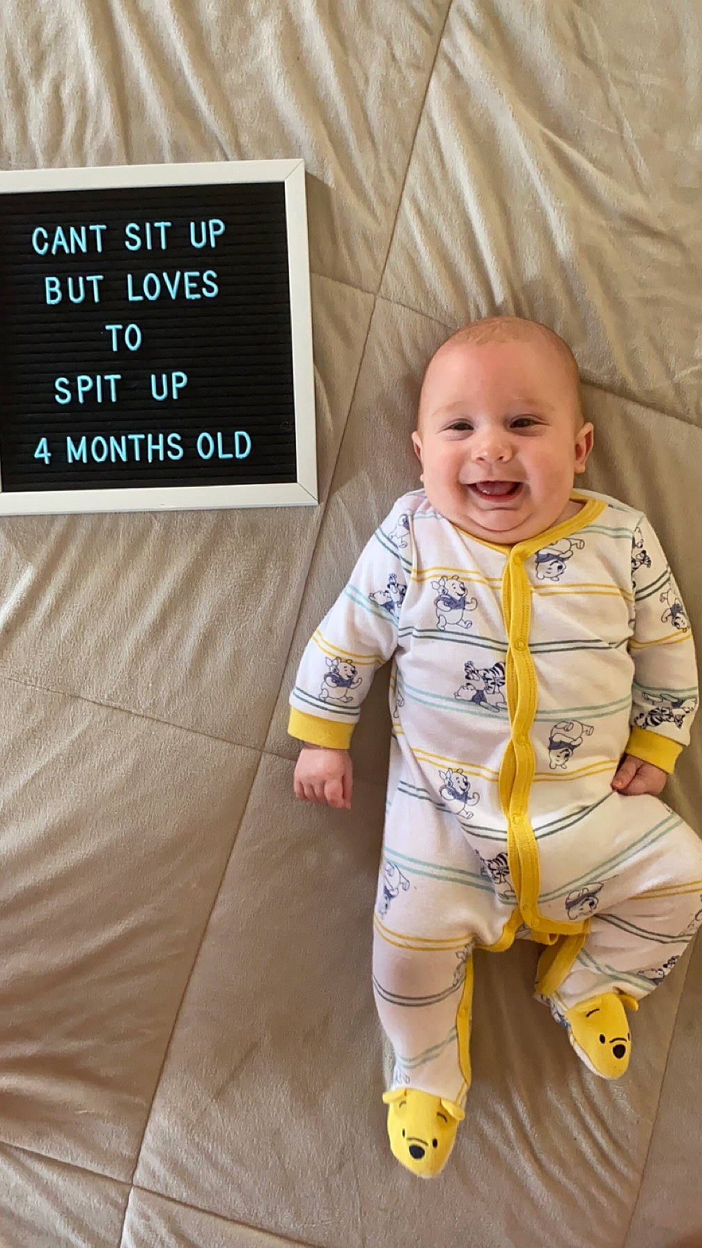 Zander is registered to the contest to win money with this photo: baby, baby_toddler_clothing, child, comfort, design, face, finger, flooring, font, happy, head, joy, mammal, person, product, room, sleeve, smile, t_shirt, textile