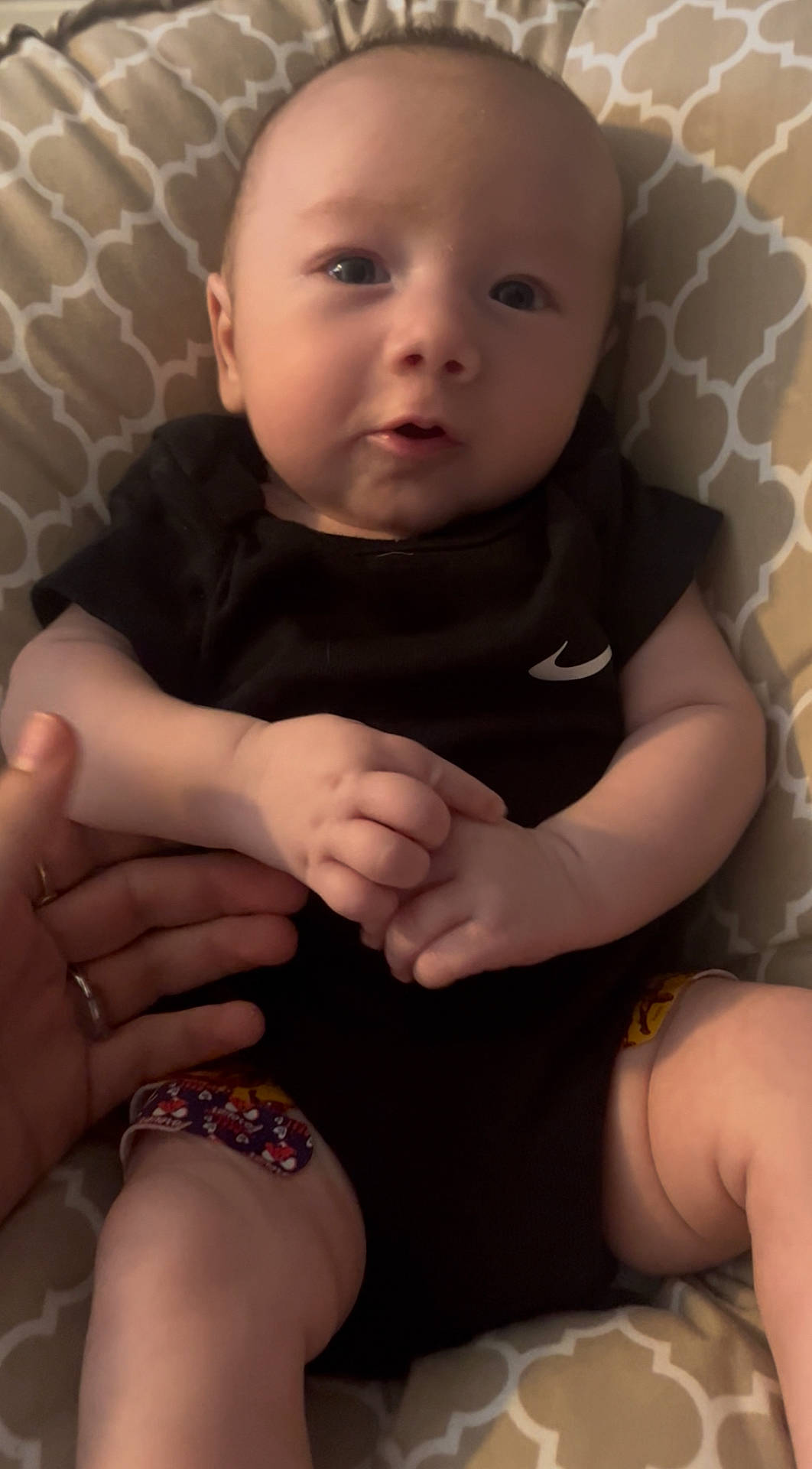 Jordan is registered to the contest to win money with this photo: accessories, ankle, baby, bodypart, couch, face, finger, furniture, hand, happy, head, jewelry, nail, newborn, person, photography, portrait, sitting, toe, wrist