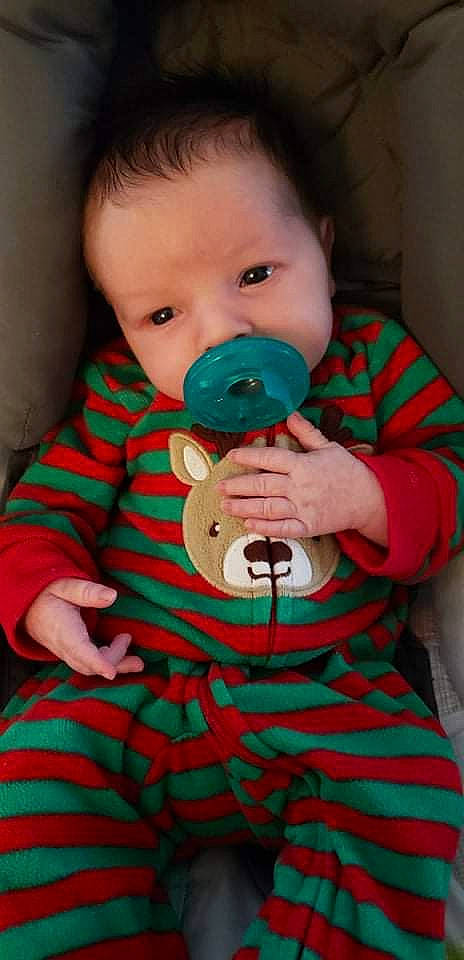 Camdyn joined the competition — help win amazing prizes! baby, baby_toddler_clothing, cheek, child, christmas, comfort, eyelash, finger, happy, holiday, linens, nose, outerwear, pattern, person, play, sitting, skin, sleeve, textile