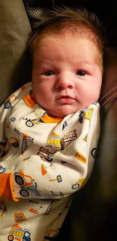 Camdyn is registered to the contest to win money with this photo: arm, baby, baby_toddler_clothing, cheek, clothing, collar, eyebrow, eyelash, face, happy, head, human_body, iris, lip, mouth, neck, nose, organ, person, sleeve