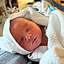 Stetson is registered to the contest to win money with this photo: newborn, baby, sleeping, towel, hospital, blanket, infant, face, skin, peaceful, wrapped, person, closeup, soft, head, cute, resting, indoors, fresh, newborn_baby