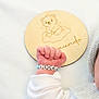 Isaac participe au concours pour gagner de l'argent avec cette photo : baby, bear_illustration, bracelet, closeup, cloud, cute, engraving, fist, hand, infant, knitted_hat, name_bracelet, newborn, peaceful, resting, skin, sleeping, soft_texture, white_clothing, wooden_plaque