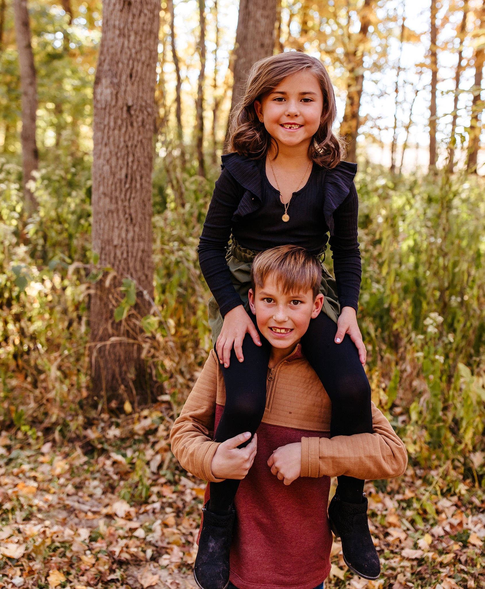 Emrie is registered to the contest to win money with this photo: branch, eye, face, forest, gesture, grass, hair, happy, head, joy, leaf, leisure, natural_landscape, people_in_nature, person, plant, recreation, smile, tree, wilderness