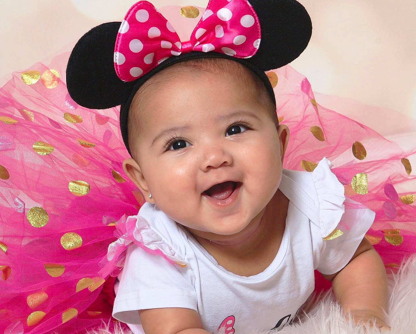 Makenzie is registered to the contest to win money with this photo: baby, baby_laughing, baby_toddler_clothing, beauty, child, costume_hat, fedora, fun, happy, hat, joy, magenta, pattern, person, pink, skin, sleeve, smile, sun_hat, textile