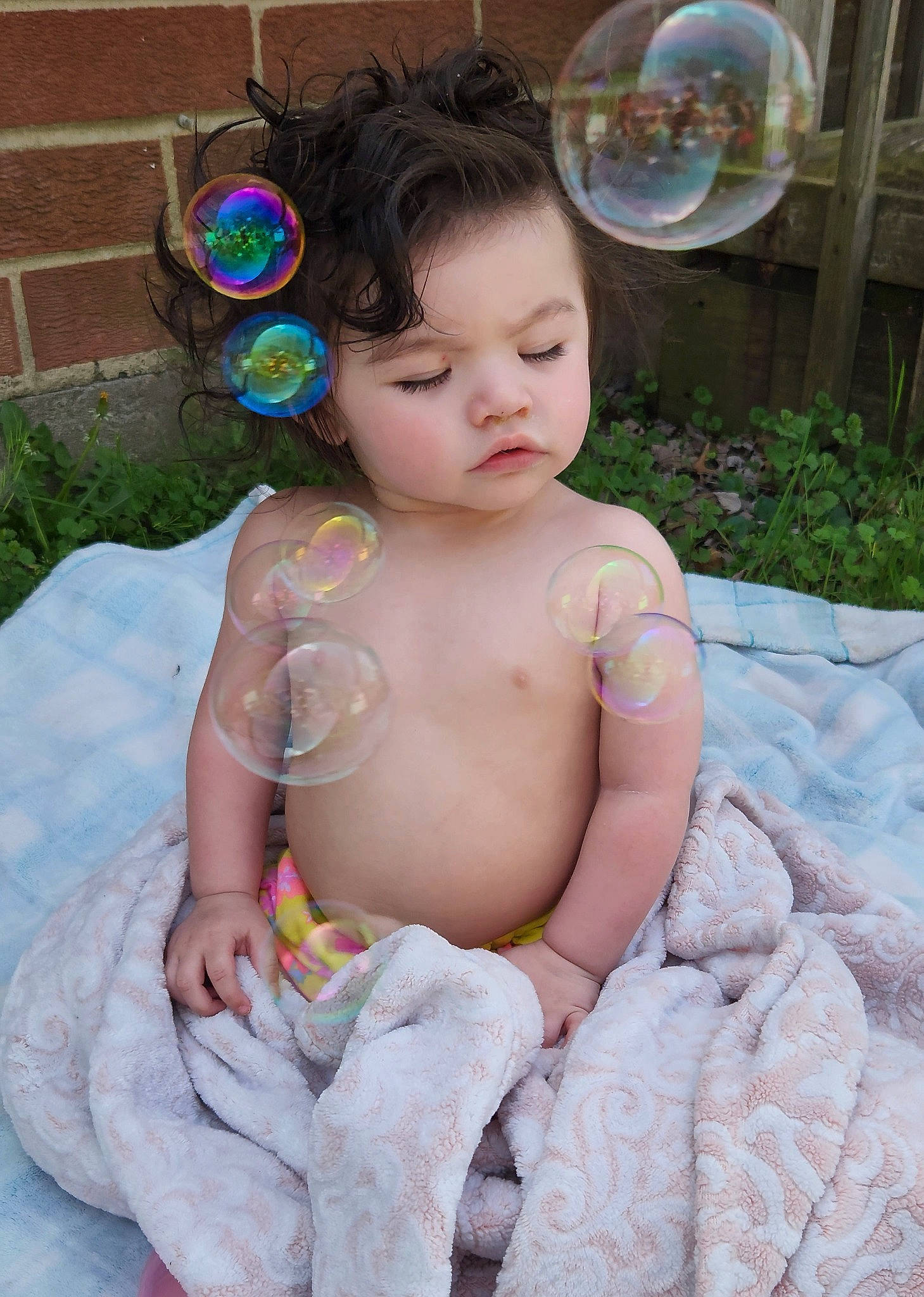 Yosselin is registered to the contest to win money with this photo: baby, baby_products, baby_toddler_clothing, barechested, cheek, chest, child, chin, diaper, fun, garden, grass, leisure, linens, mechanical_fan, person, pink, plant, sitting, skin