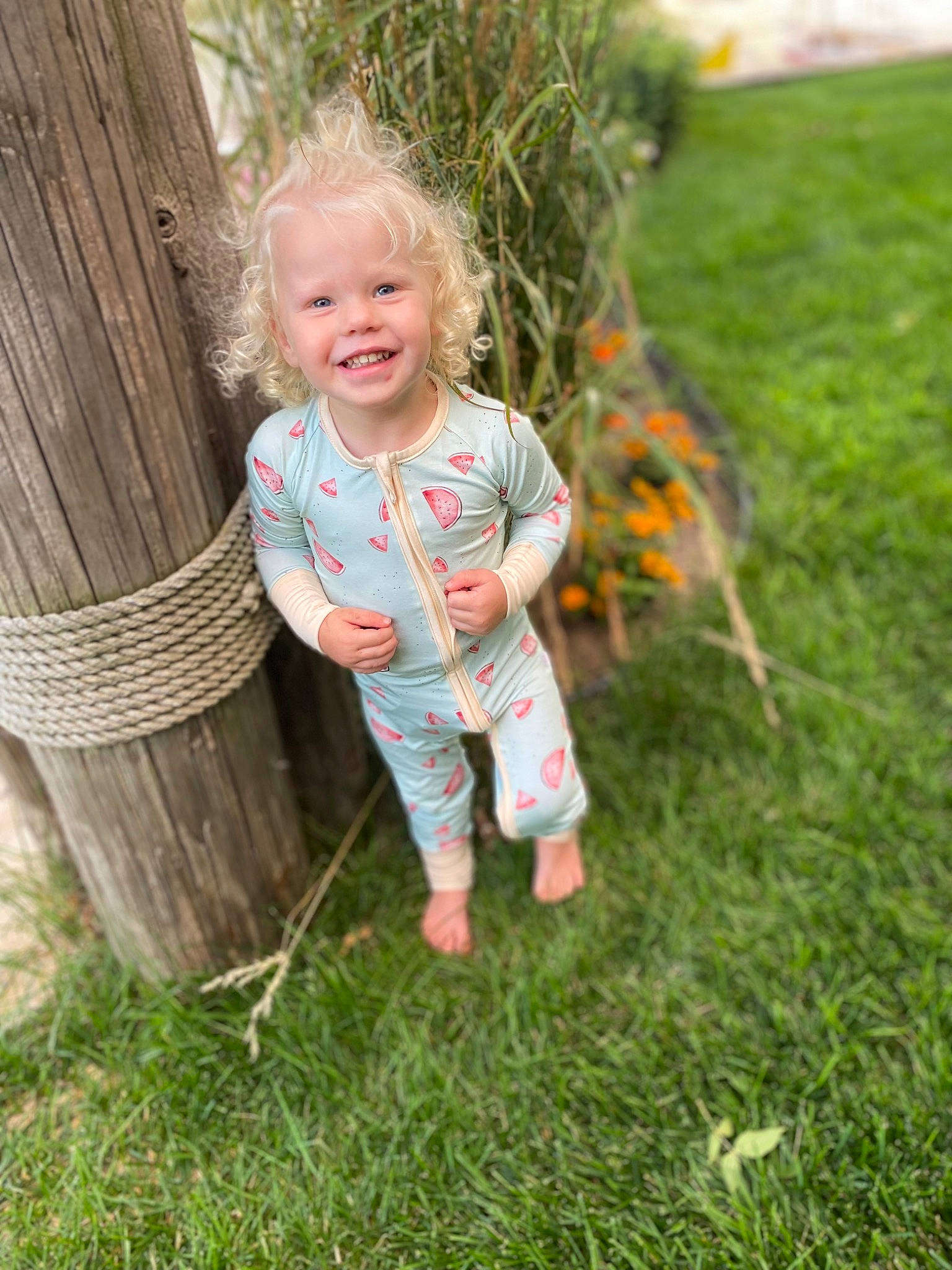 Alice is registered to the contest to win money with this photo: baby, baby_toddler_clothing, child, eye, foot, fun, grass, grass_family, happy, head, joy, leaf, leisure, people_in_nature, person, plant, sitting, skin, smile, toddler