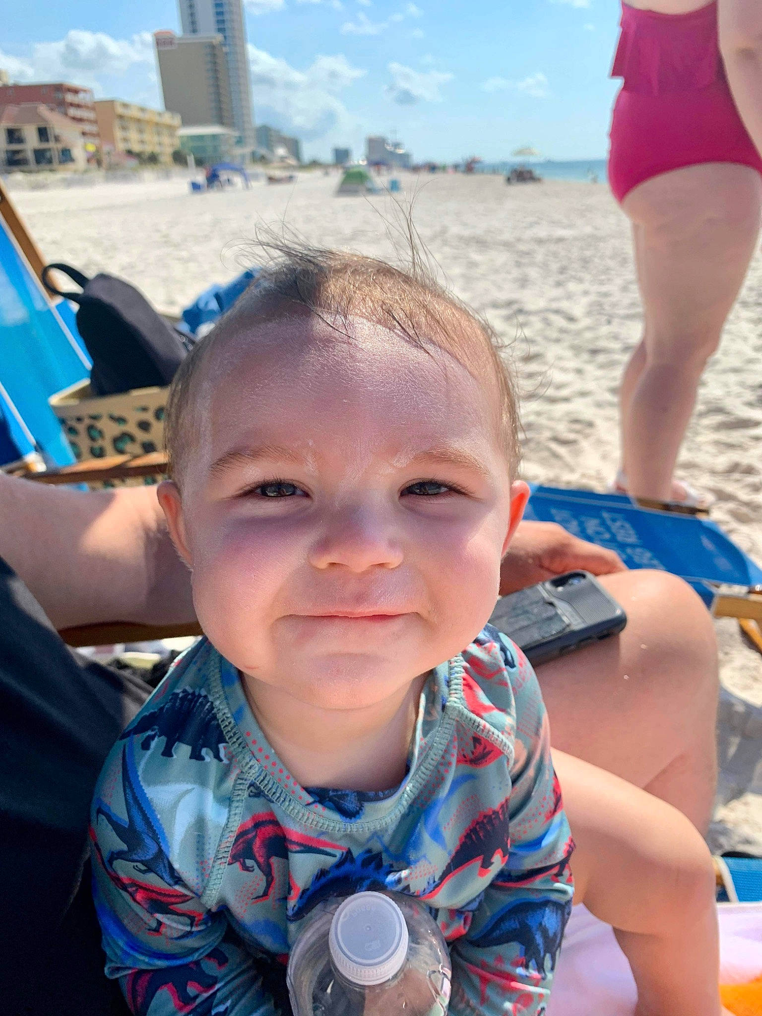 Weston is registered to the contest to win money with this photo: azure, baby, baby_toddler_clothing, beach, blue, cloud, fun, happy, joy, leisure, people, person, photograph, recreation, shorts, skin, sky, snapshot, summer, toddler