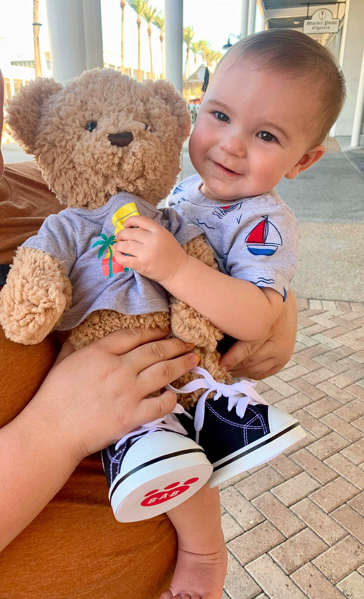 Weston is registered to the contest to win money with this photo: baby_toddler_clothing, child, eye, fun, gesture, happy, joint, joy, organ, people, person, photograph, skin, smile, stuffed_toy, teddy_bear, thigh, thumb, toddler, toy