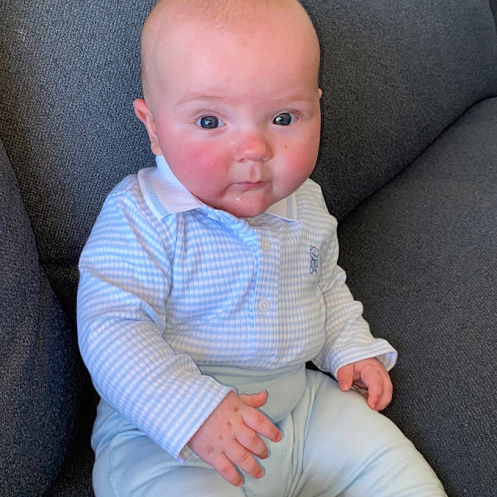 Larsson joined the competition — help win amazing prizes! baby, bodypart, chair, clothing, couch, cushion, face, finger, furniture, hand, head, homedecor, hosiery, jeans, pants, person, photography, portrait, shirt, sitting