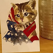 Atchoum participe au concours pour gagner de l'argent avec cette photo : american_flag, art, background, cat, closeup, colorful, decor, drawing, feline, illustration, indoor, kitten, painting, patriotic, still_life, table, vase, warm_lighting, watercolor, wooden_surface
