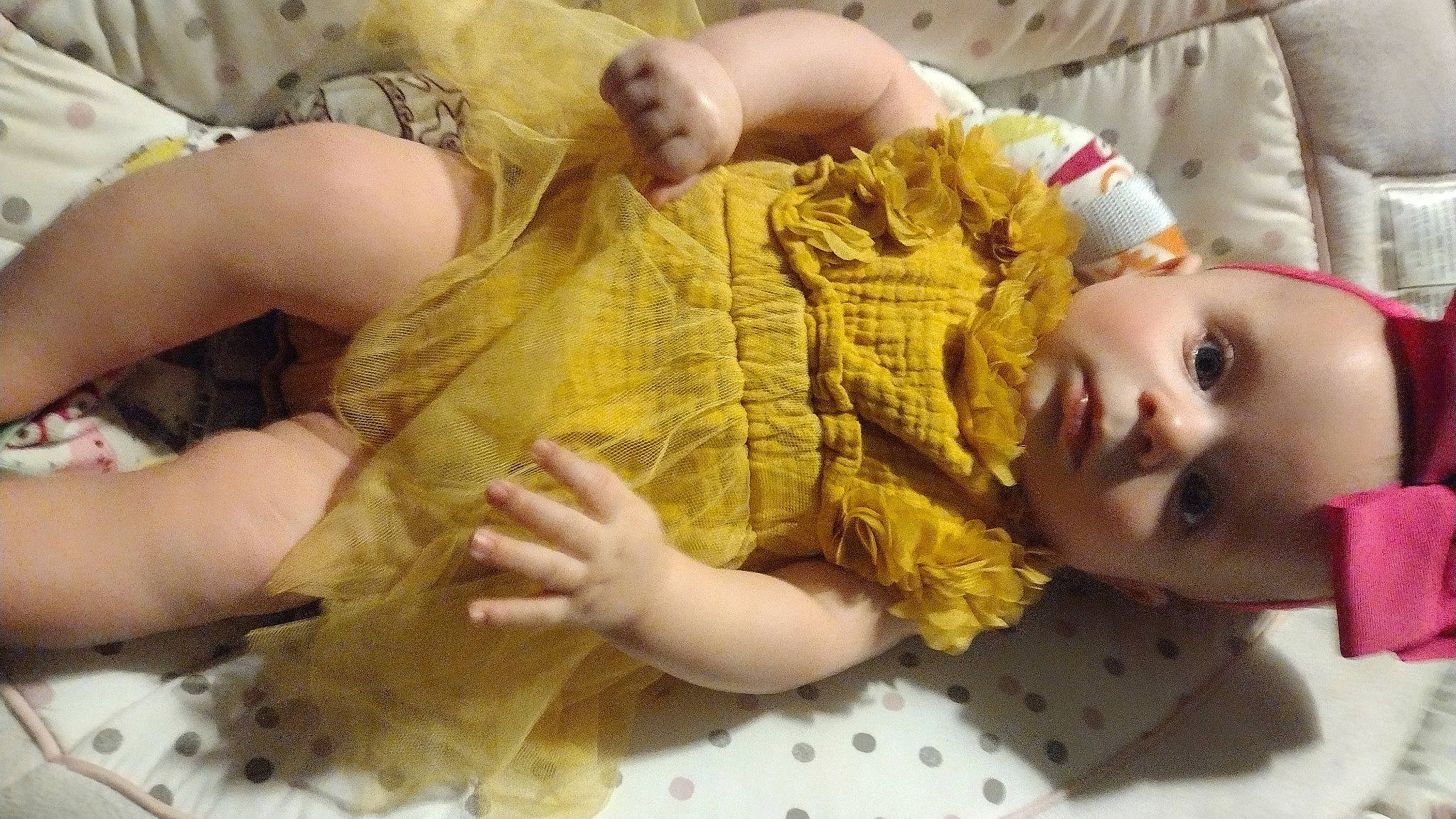 Adeline is registered to the contest to win money with this photo: baby, baby_toddler_clothing, cheek, child, comfort, eye, eyelash, finger, flooring, gesture, linens, nail, pattern, person, skin, sleeve, thumb, toddler, wood, wool