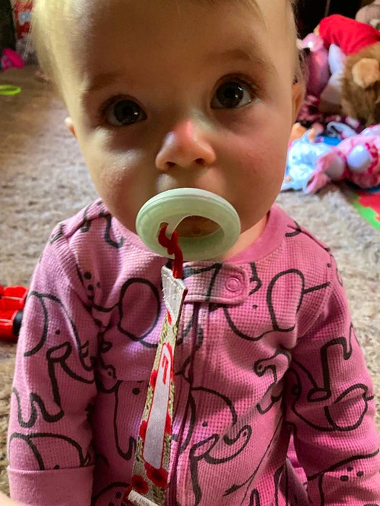 Adeline is registered to the contest to win money with this photo: baby, baby_products, baby_toddler_clothing, child, drinkware, eyelash, fun, grass, happy, nose, pattern, person, photograph, play, toddler