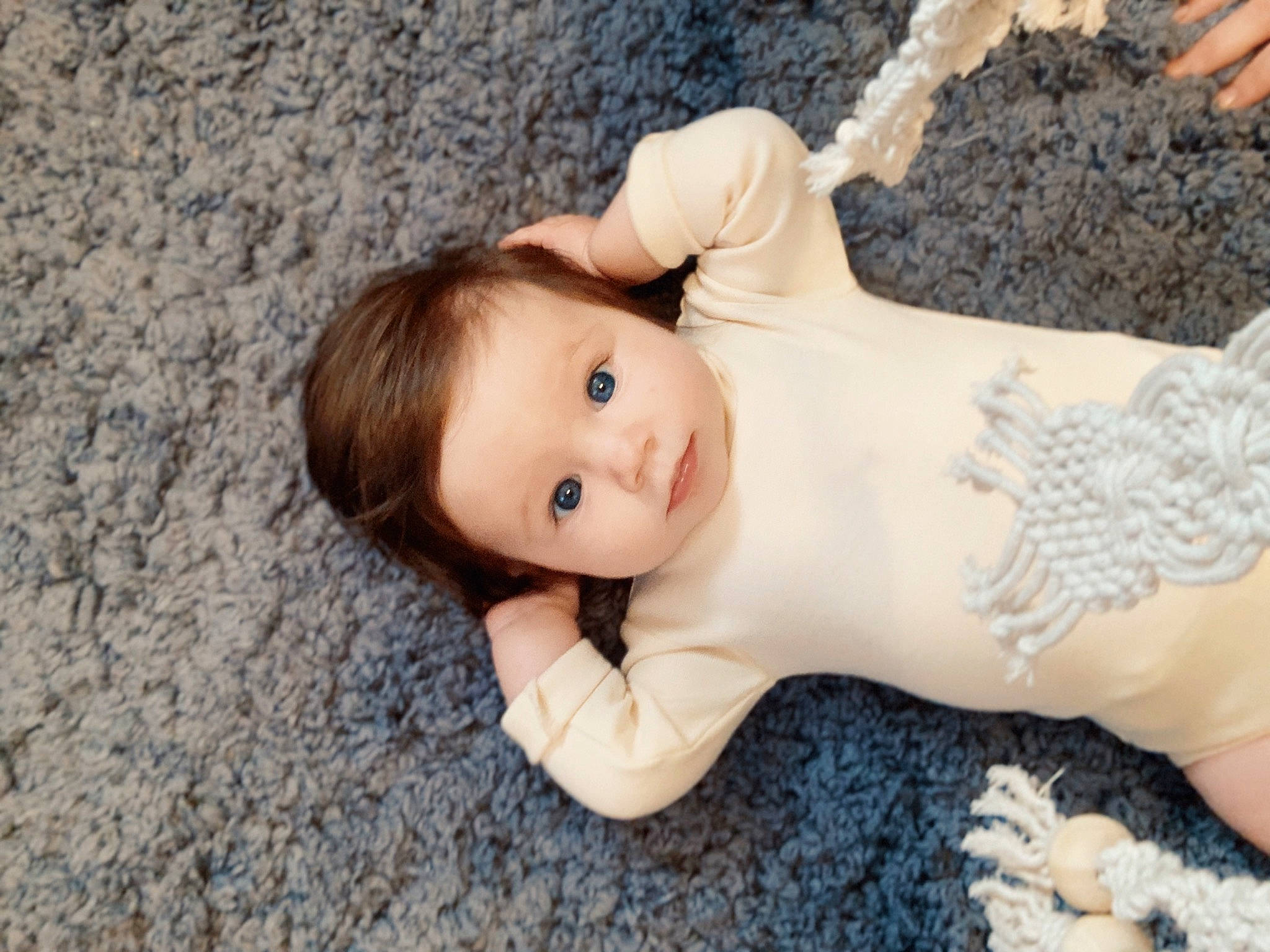 Juniper is registered to the contest to win money with this photo: baby, child, doll, fawn, figurine, person, skin, toddler, toy