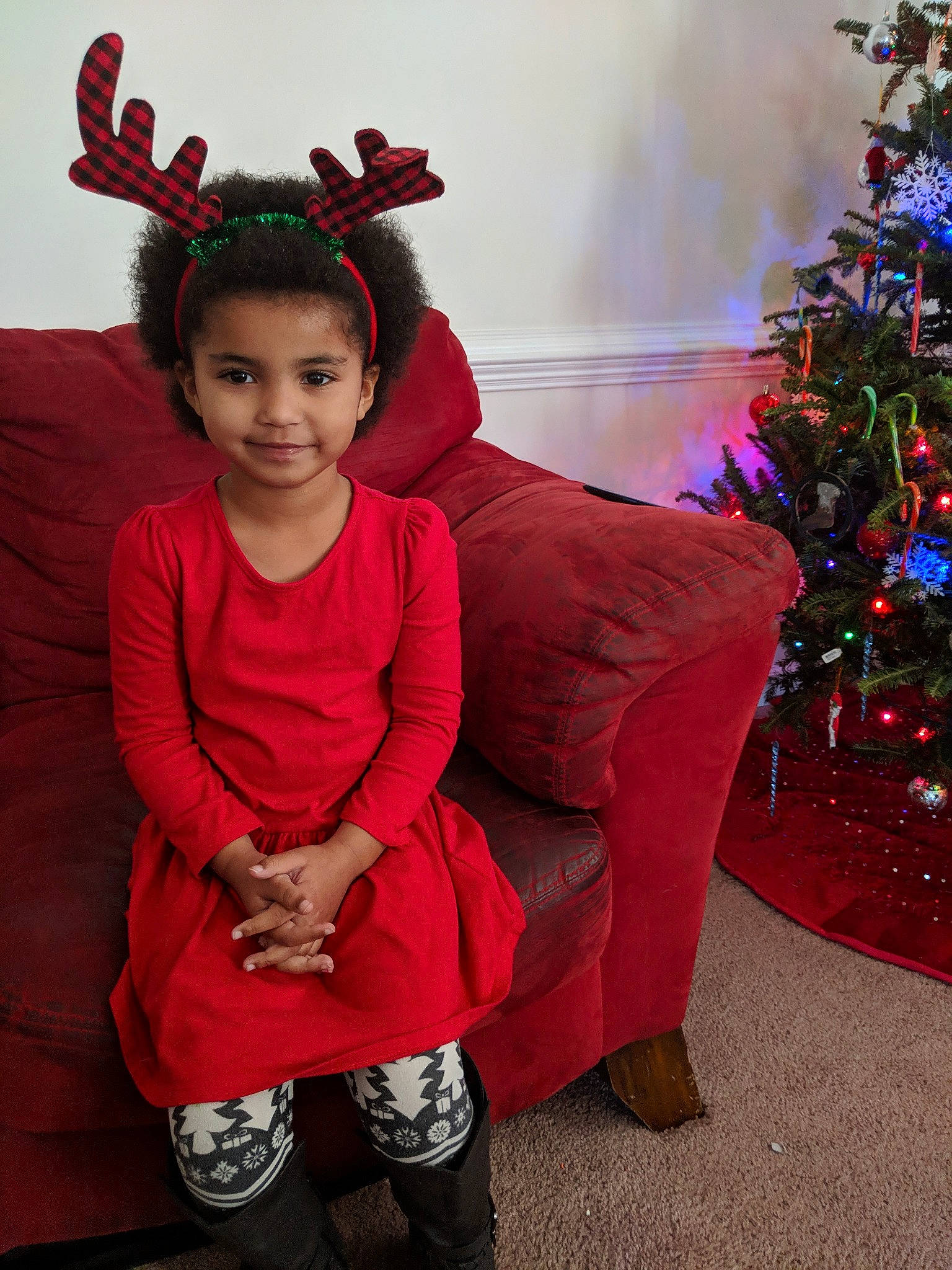 Jacqueline is registered to the contest to win money with this photo: child, christmas, costume, event, fun, girl, holiday, person, pink, red, smile, toddler, tradition