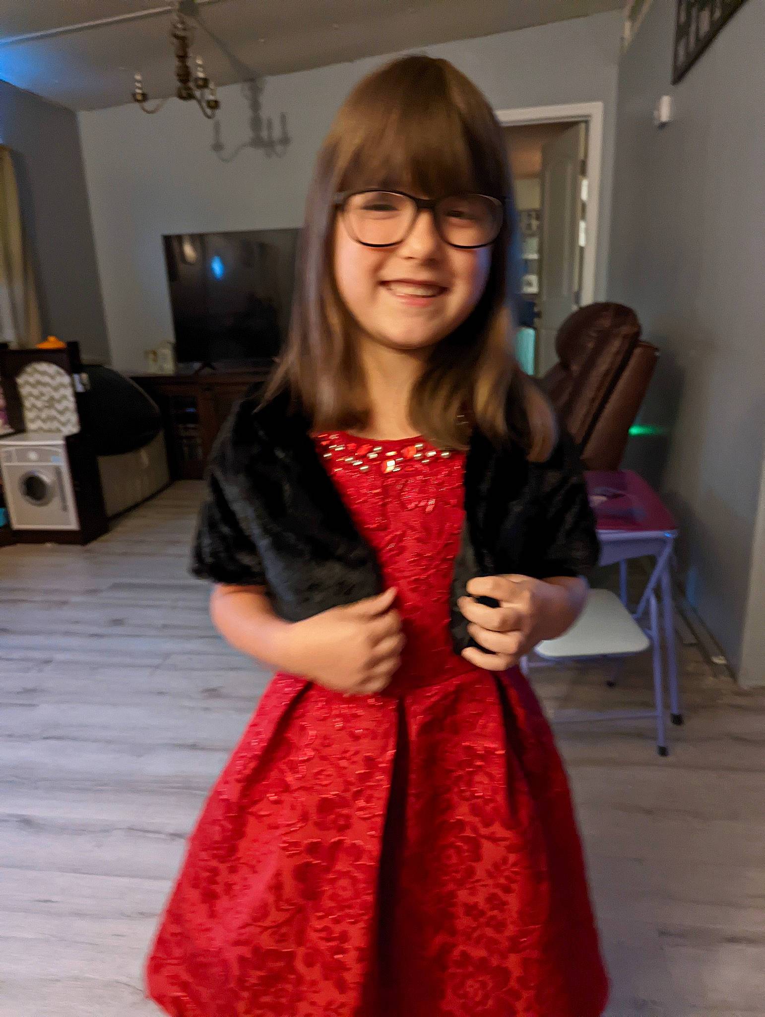 Patricia is registered to the contest to win money with this photo: beauty, clothing, dress, event, fashion, fashion_design, flooring, formal_wear, glasses, joint, joy, one_piece_garment, pattern, person, plaid, shoulder, sleeve, smile, toddler, trunk