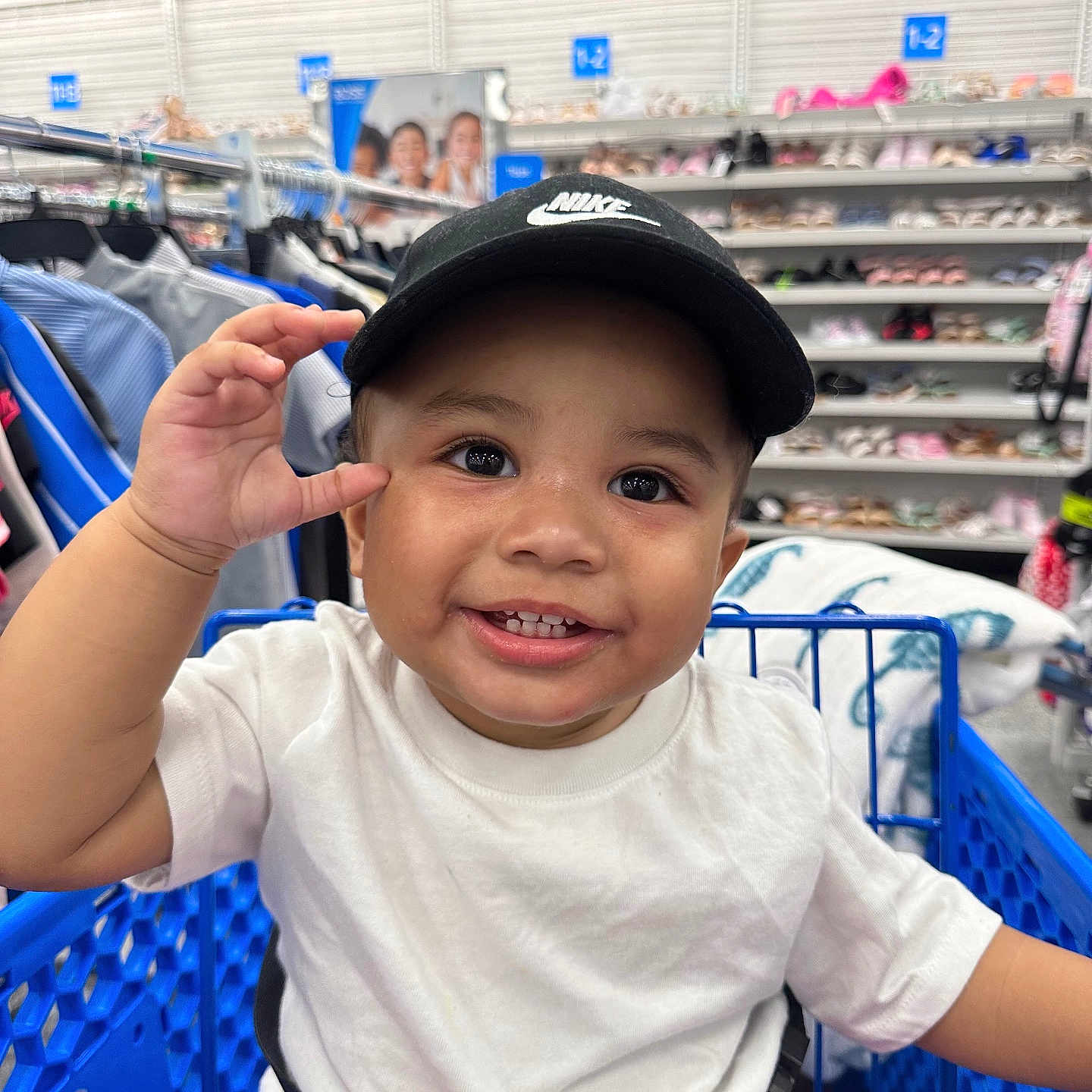 Jedi Lucas joined the competition — help win amazing prizes! aisle, baby, black_cap, child, clothing_rack, cute, face, hand, happy, indoor, person, red_pants, retail, seatbelt, shoes, shopping_cart, smiling, store, toddler, white_shirt