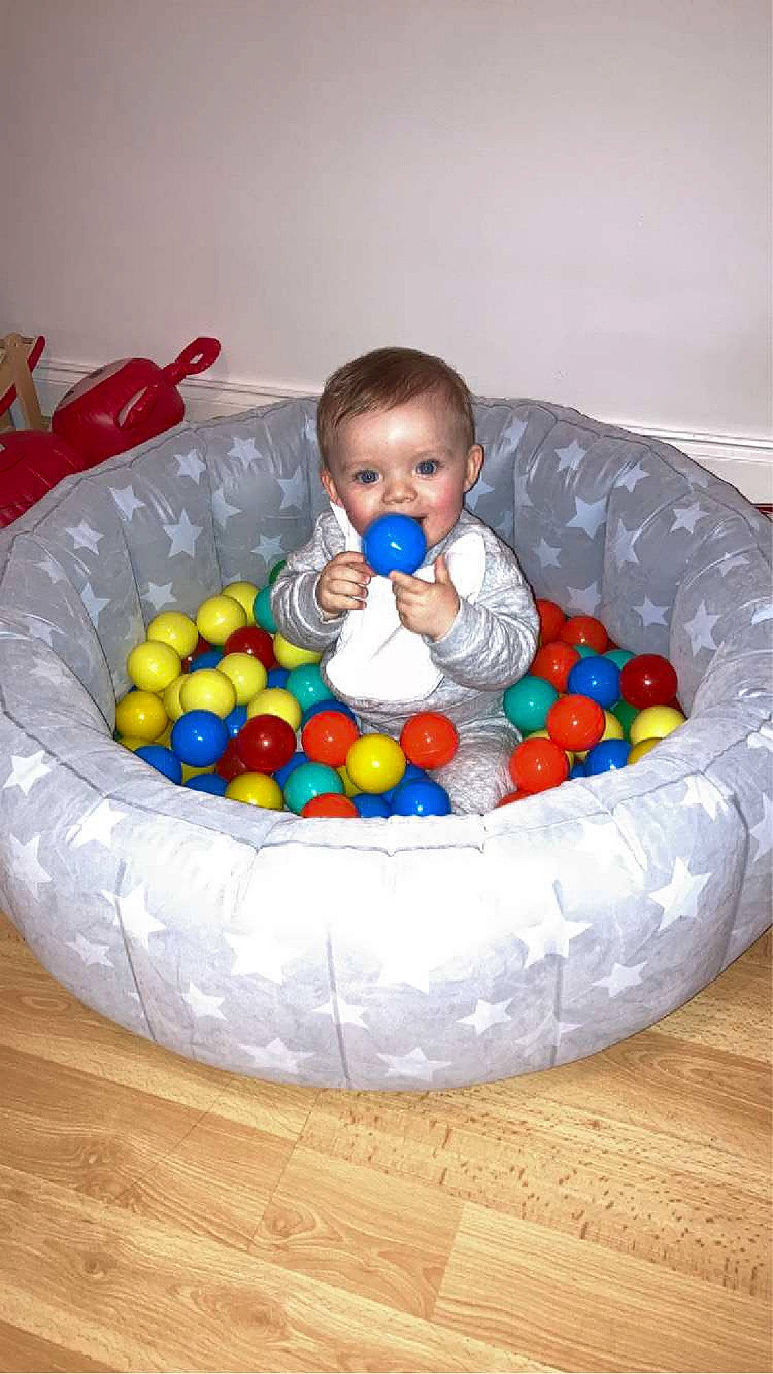 Louie is registered to the contest to win money with this photo: baby, baby_products, baby_toddler_clothing, baby_toys, ball, basket, bathing, child, circle, comfort, fun, infant_bed, pattern, person, plastic, play, product, sitting, sweetness, toddler
