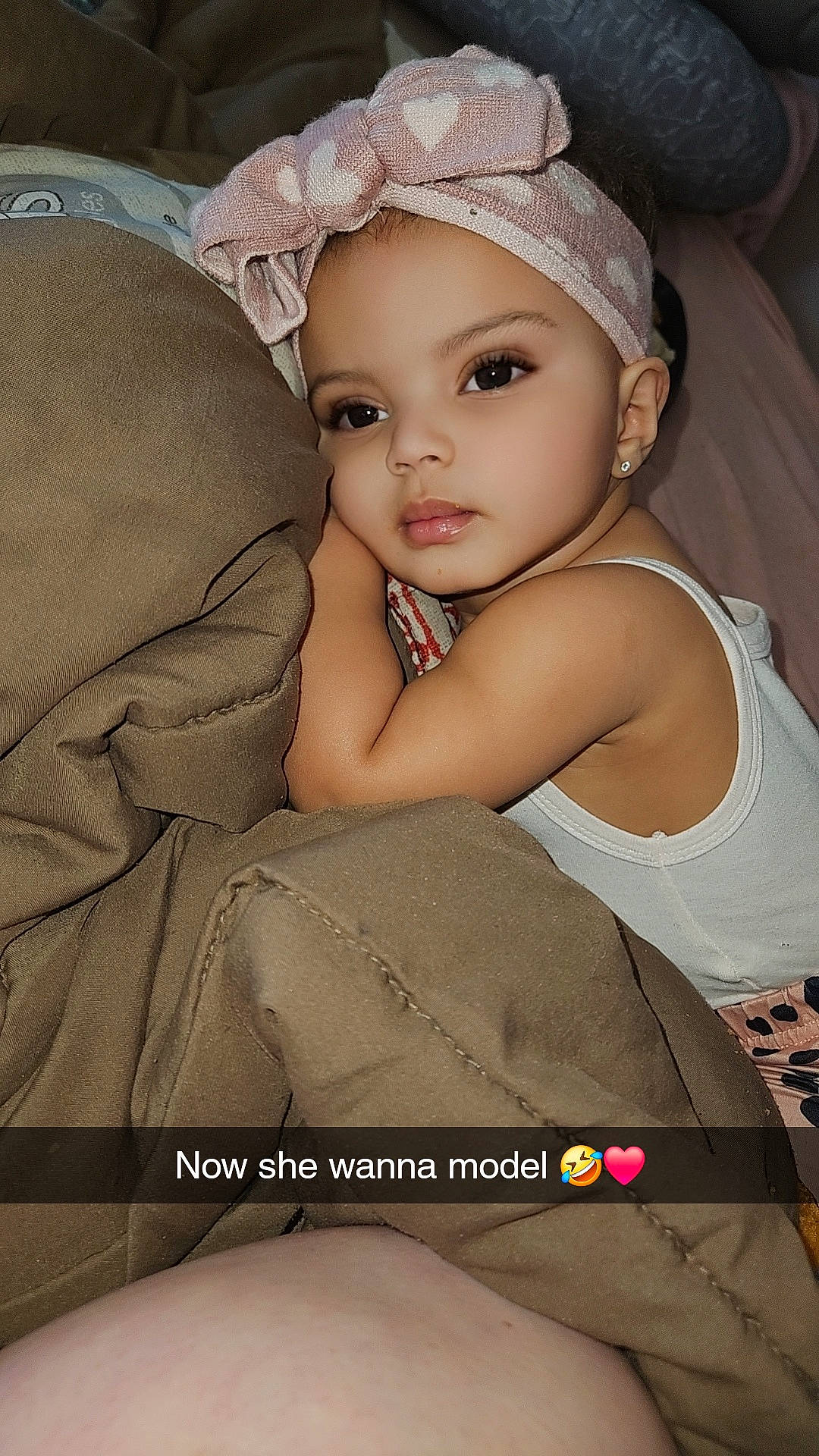 Sierra joined the competition — help win amazing prizes! baby, beauty, cap, child, comfort, costume_hat, eye, eyelash, fashion_accessory, flash_photography, hair_accessory, happy, headband, headpiece, headwear, jewellery, person, photo_caption, sitting, skin