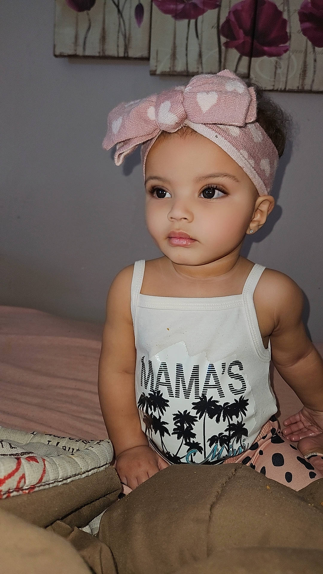 Sierra joined the competition — help win amazing prizes! baby, baby_toddler_clothing, cap, cheek, child, costume_hat, eyelash, fashion_accessory, flash_photography, happy, headgear, headpiece, headwear, jewellery, lip, person, sitting, skin, sleeve, t_shirt