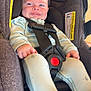 Nash is registered to the contest to win money with this photo: baby, car_seat, child, infant, smiling, straps, clothing, pajamas, seatbelt, safety, cute, indoor, person, face, happy, baby_clothes, small_child, head, legs, footwear