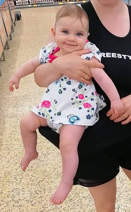 Kristina joined the competition — help win amazing prizes! baby_toddler_clothing, facial_expression, finger, gesture, hairstyle, happy, head, human_body, joint, joy, leg, person, photograph, pink, shoulder, skin, sleeve, smile, standing, textile