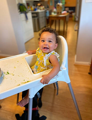 Katara is registered to the contest to win money with this photo: baby, baby_toddler_clothing, chair, child, comfort, event, flooring, fun, happy, hardwood, leisure, party, person, refrigerator, room, sitting, smile, toddler, wood, wood_flooring
